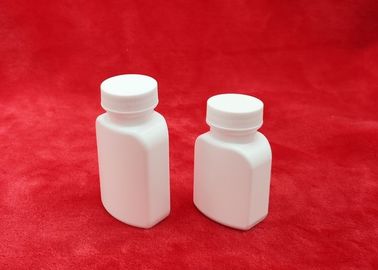 Kwadratowe plastikowe butelki z polietylenu o wysokiej gęstości na etapie pakowania żywności na pigułki